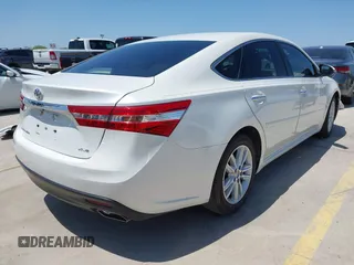 2014 Toyota Avalon Limited with VIN 4T1BK1EB2EU083624, listed as a IAAI auction lot 41963742 with 94,140 mi miles. Bid and sale history available at carsss.com. Image 4.