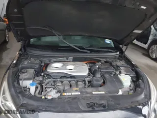 2016 Hyundai Sonata Hybrid SE with VIN KMHE24L12GA037983, listed as a IAAI auction lot 42078321 with 113,998 mi miles. Bid and sale history available at carsss.com. Image 10.