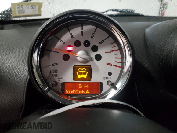 2013 MINI Countryman S ALL4 with VIN WMWZC5C56DWM15763, listed as a Copart auction lot 51165565 with 165,494 mi miles and Salvage Title. Bid and sale history available at DreamBid. Image 9.