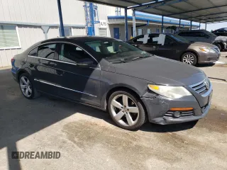 2012 Volkswagen CC Lux PZEV with VIN WVWHP7AN7CE505154, listed as a Copart auction lot 51849365 with 125,124 mi miles and Salvage Title. Bid and sale history available at carsss.com. Image 4.