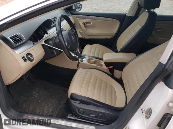 2013 Volkswagen CC R-Line z VIN WVWBN7AN6DE504252, wystawiony jako Copart lot #51750095 z przebiegiem 166 427 mil mil oraz Czysty tytuł • Clean title. Historia ofert i sprzedaży dostępna na DreamBid. Obrazek 7.