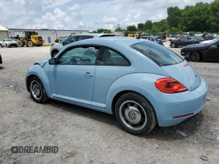 2012 Volkswagen Beetle 2.5L PZEV with VIN 3VWJP7AT1CM652044, listed as a Copart auction lot 60855665 with 49,481 mi miles and Clean title. Bid and sale history available at DreamBid. Image 2.
