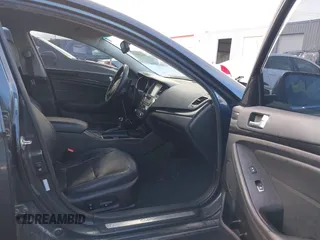 2014 Kia Cadenza Premium with VIN KNALN4D77E5127042, listed as a IAAI auction lot 41189073 with 131,059 mi miles. Bid and sale history available at carsss.com. Image 5.
