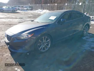 2014 Mazda 6 i Grand Touring with VIN JM1GJ1W67E1137886, listed as a IAAI auction lot 41405112 with 159,879 mi miles and . Bid and sale history available at DreamBid. Image 17.