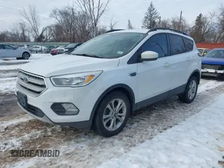 2018 Ford Escape SE with VIN 1FMCU0GD1JUC48757, listed as a IAAI auction lot 41631583 with 80,700 mi miles. Bid and sale history available at carsss.com. Image 2.