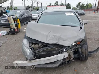 2006 Honda Civic LX with VIN 2HGFA16586H507296, listed as a IAAI auction lot 42101001 with 144,781 mi miles and . Bid and sale history available at DreamBid. Image 13.