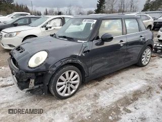2015 MINI Cooper Hardtop 4 Door S with VIN WMWXU3C53F2B62410, listed as a Copart auction lot 88156885 with 157,583 mi miles and Salvage Title. Bid and sale history available at carsss.com. Image 1.
