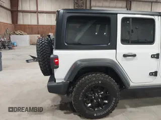 2023 Jeep Wrangler Sport S with VIN 1C4HJXDN2PW632584, listed as a IAAI auction lot 41965191 with 20,288 mi miles and . Bid and sale history available at DreamBid. Image 19.