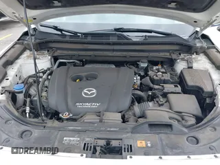 2019 Mazda CX-5 Sport with VIN JM3KFABM4K1565787, listed as a IAAI auction lot 42054585 with 80,580 mi miles and . Bid and sale history available at DreamBid. Image 10.