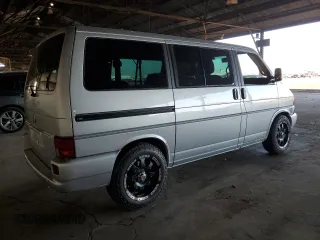 2002 Volkswagen EuroVan с VIN WV2KB47072H012135, выставлен на аукционе Copart как лот 84215364 с пробегом 170 220 миль миль и Чистый • Clean title. История ставок и продаж доступна на DreamBid. Изображение 3.