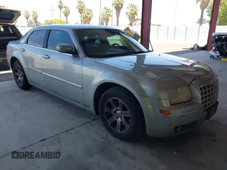 2006 Chrysler 300 Touring z VIN 2C3KA53G66H388470, wystawiony jako IAAI lot #42360882 z przebiegiem 228 523 mil mil oraz . Historia ofert i sprzedaży dostępna na DreamBid. Obrazek 1.