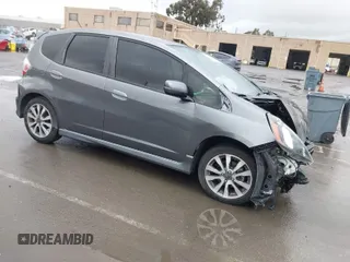 2013 Honda Fit Sport with VIN JHMGE8H52DC018498, listed as a IAAI auction lot 41935157 with 111,922 mi miles. Bid and sale history available at carsss.com. Image 1.