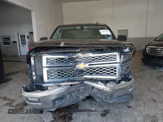 2014 Chevrolet Silverado 1500 LT with VIN 3GCUKREC6EG255502, listed as a IAAI auction lot 41861164 with 164,708 mi miles and . Bid and sale history available at DreamBid. Image 6.