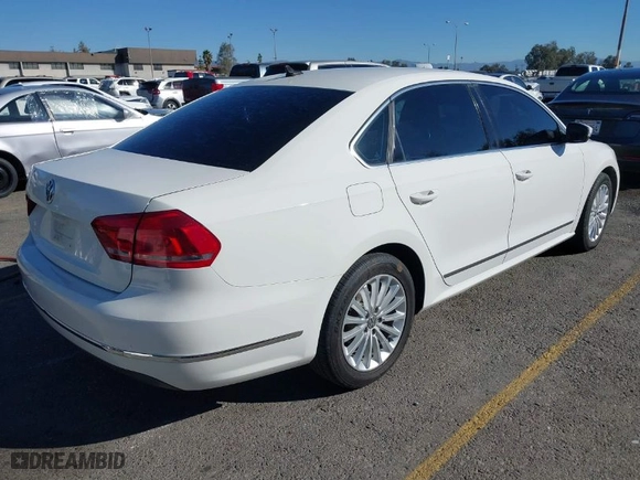 2015 Volkswagen Passat 1.8T SE w/Sunroof & Nav with VIN 1VWBT7A3XFC075648, listed as a IAAI auction lot 40808040 with 189,620 mi miles. Bid and sale history available at carsss.com. Image 4.