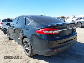 2018 Ford Fusion SE z VIN 3FA6P0H77JR180057, wystawiony jako IAAI lot #41729451 z przebiegiem 122 200 mil mil oraz . Historia ofert i sprzedaży dostępna na DreamBid. Obrazek 3.