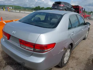 2003 Honda Accord LX z VIN JHMCM56383C005707, wystawiony jako IAAI lot #42264937 z przebiegiem 297 192 mil mil oraz . Historia ofert i sprzedaży dostępna na DreamBid. Obrazek 4.