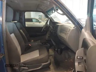 2011 Ford Ranger XLT with VIN 1FTLR4FE3BPA52049, listed as a IAAI auction lot 41394422 with 112,080 mi miles. Bid and sale history available at carsss.com. Image 5.