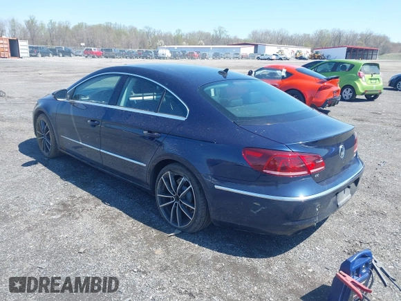 2014 Volkswagen CC Sport z VIN WVWBN7AN7EE511759, wystawiony jako IAAI lot #42002504 z przebiegiem 111 900 mil mil oraz . Historia ofert i sprzedaży dostępna na DreamBid. Obrazek 3.