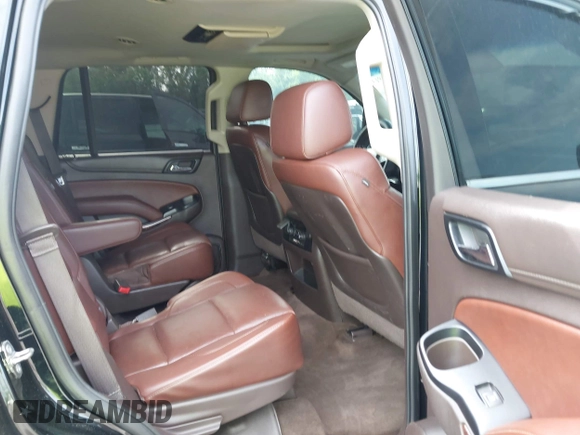 2015 Chevrolet Tahoe LTZ with VIN 1GNSCCKC5FR103676, listed as a IAAI auction lot 42456913 with 214,009 mi miles and . Bid and sale history available at DreamBid. Image 8.