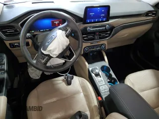 2020 Ford Escape Titanium Hybrid с VIN 1FMCU9DZ3LUB58677, выставлен на аукционе Copart как лот 54164465 с пробегом 32 115 миль миль и Списание • Salvage title. История ставок и продаж доступна на DreamBid. Изображение 8.