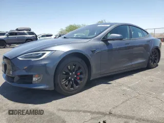 2018 Tesla Model S 75D with VIN 5YJSA1E41JF258201, listed as a Copart auction lot 61670835 with Not provided miles and Salvage title. Bid and sale history available at DreamBid. Image 1.