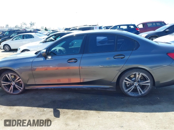 2019 BMW 3 Series 330i with VIN WBA5R1C55KAK11925, listed as a IAAI auction lot 41982248 with 62,711 mi miles and . Bid and sale history available at DreamBid. Image 14.
