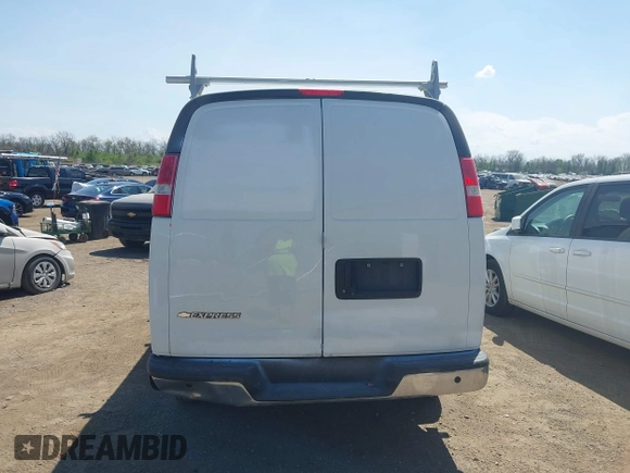 2019 Chevrolet Express Cargo with VIN 1GCWGAFP3K1249390, listed as a IAAI auction lot 42101049 with 82,211 mi miles. Bid and sale history available at carsss.com. Image 16.