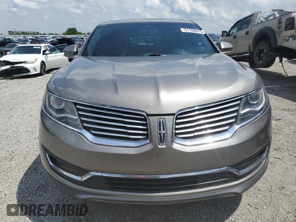 2016 Lincoln MKX Premiere z VIN 2LMTJ6JR9GBL78904, wystawiony jako Copart lot #51188815 z przebiegiem 120 123 mil mil oraz Szkoda całkowita • Salvage title. Historia ofert i sprzedaży dostępna na DreamBid. Obrazek 5.