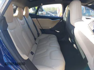2016 Tesla Model S 90D with VIN 5YJSA1E25GF144614, listed as a IAAI auction lot 40941311 with 83,587 mi miles and . Bid and sale history available at DreamBid. Image 8.