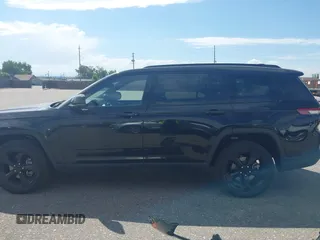 2023 Jeep Grand Cherokee Altitude with VIN 1C4RJJAG4P8817795, listed as a IAAI auction lot 42572709 with 49,468 mi miles and . Bid and sale history available at DreamBid. Image 15.
