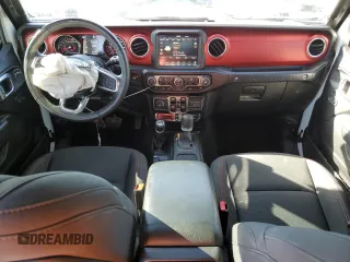 2022 Jeep Wrangler Unlimited Rubicon with VIN 1C4JJXFG2NW125360, listed as a Copart auction lot 76773624 with 22,978 mi miles and Salvage title. Bid and sale history available at DreamBid. Image 8.