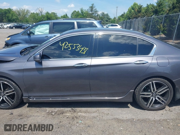 2017 Honda Accord Touring with VIN 1HGCR3F98HA015928, listed as a IAAI auction lot 42553437 with 168,902 mi miles and . Bid and sale history available at DreamBid. Image 14.
