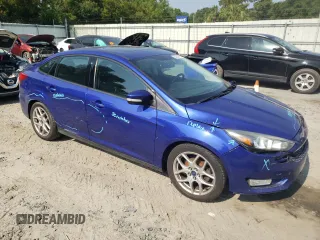 2015 Ford Focus SE with VIN 1FADP3F2XFL299193, listed as a Copart auction lot 59744715 with 141,317 mi miles and Salvage title. Bid and sale history available at DreamBid. Image 4.
