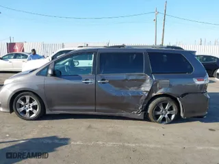 2015 Toyota Sienna SE with VIN 5TDXK3DC9FS551094, listed as a IAAI auction lot 41676903 with 94,345 mi miles. Bid and sale history available at carsss.com. Image 14.