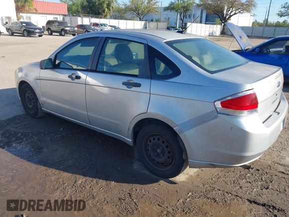 2009 Ford Focus S with VIN 1FAHP34N79W221813, listed as a IAAI auction lot 41758471 with 248,531 mi miles. Bid and sale history available at carsss.com. Image 3.