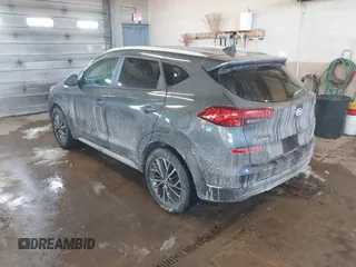 2019 Hyundai Tucson Ultimate with VIN KM8J3CAL0KU063161, listed as a IAAI auction lot 41606894 with 56,037 mi miles. Bid and sale history available at carsss.com. Image 3.