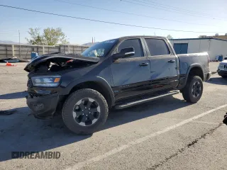 2020 Ram 1500 Rebel with VIN 1C6SRFLT6LN141838, listed as a Copart auction lot 54799315 with 79,654 mi miles and Salvage title. Bid and sale history available at DreamBid. Image 1.