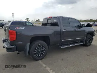 2014 Chevrolet Silverado 1500 LTZ with VIN 1GCVKSEC1EZ134582, listed as a Copart auction lot 50472335 with 93,362 mi miles and Salvage Title. Bid and sale history available at DreamBid. Image 3.