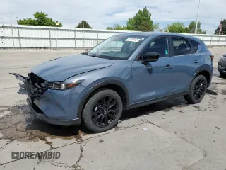 2023 Mazda CX-5 S Carbon Edition z VIN JM3KFBCM4P0292240, wystawiony jako Copart lot #54338815 z przebiegiem 29 994 mil mil oraz Szkody całkowita. Historia ofert i sprzedaży dostępna na DreamBid. Obrazek 1.