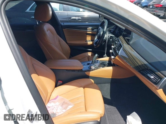 2018 BMW 5 Series 530i with VIN WBAJA5C5XJWA39179, listed as a IAAI auction lot 42380945 with 76,410 mi miles and . Bid and sale history available at DreamBid. Image 5.