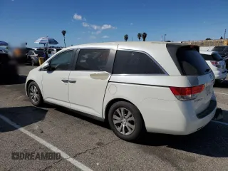 2014 Honda Odyssey EX-L with VIN 5FNRL5H6XEB060557, listed as a Copart auction lot 47141835 with 214,718 mi miles and Clean Title. Bid and sale history available at DreamBid. Image 2.