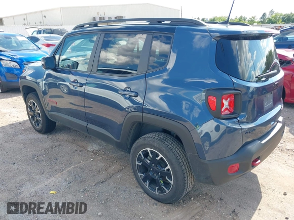 2023 Jeep Renegade Trailhawk with VIN ZACNJDC19PPP70231, listed as a IAAI auction lot 42236217 with 30,880 mi miles and . Bid and sale history available at DreamBid. Image 3.