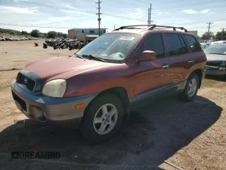 2002 Hyundai Santa Fe GLS with VIN KM8SC73D42U231286, listed as a Copart auction lot 71290624 with 187,534 mi miles and Salvage Title. Bid and sale history available at carsss.com. Image 1.