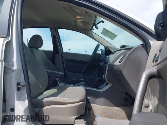 2011 Ford Focus S with VIN 1FAHP3EN7BW113051, listed as a IAAI auction lot 42002223 with 220,895 mi miles. Bid and sale history available at carsss.com. Image 5.