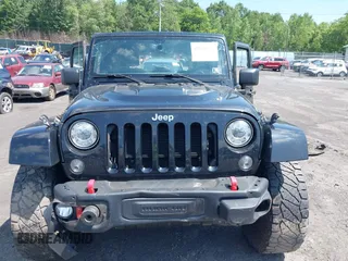 2017 Jeep Wrangler Unlimited Rubicon Recon with VIN 1C4BJWFG7HL525709, listed as a IAAI auction lot 42569577 with 119,560 mi miles and . Bid and sale history available at DreamBid. Image 12.