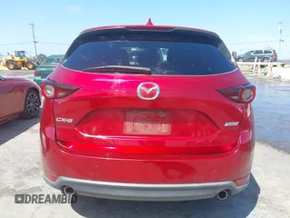 2019 Mazda CX-5 Touring with VIN JM3KFACM5K1516242, listed as a IAAI auction lot 42019803 with 113,953 mi miles. Bid and sale history available at carsss.com. Image 16.