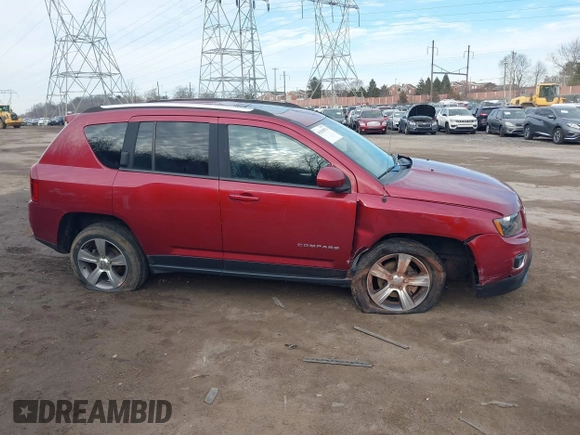 2016 Jeep Compass High Altitude Edition with VIN 1C4NJDEB1GD729471, listed as a IAAI auction lot 41616976 with 124,385 mi miles. Bid and sale history available at carsss.com. Image 14.