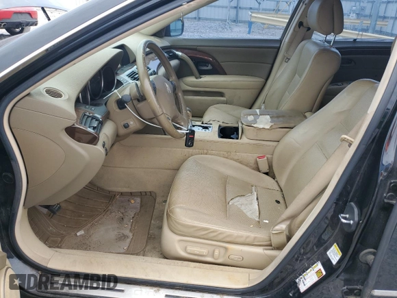 2006 Acura RL z VIN JH4KB16586C010597, wystawiony jako Copart lot #53846535 z przebiegiem 212 219 mil mil oraz Szkoda całkowita • Salvage title. Historia ofert i sprzedaży dostępna na DreamBid. Obrazek 7.