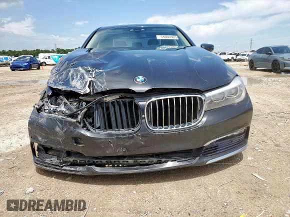 2016 BMW 7 Series 740i with VIN WBA7E2C57GG714564, listed as a Copart auction lot 64005965 with 111,598 mi miles and Salvage title. Bid and sale history available at DreamBid. Image 5.
