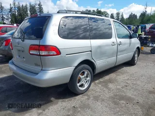 2002 Toyota Sienna LE with VIN 4T3ZF13C02U421846, listed as a IAAI auction lot 42250815 with 182,268 mi miles and . Bid and sale history available at DreamBid. Image 4.